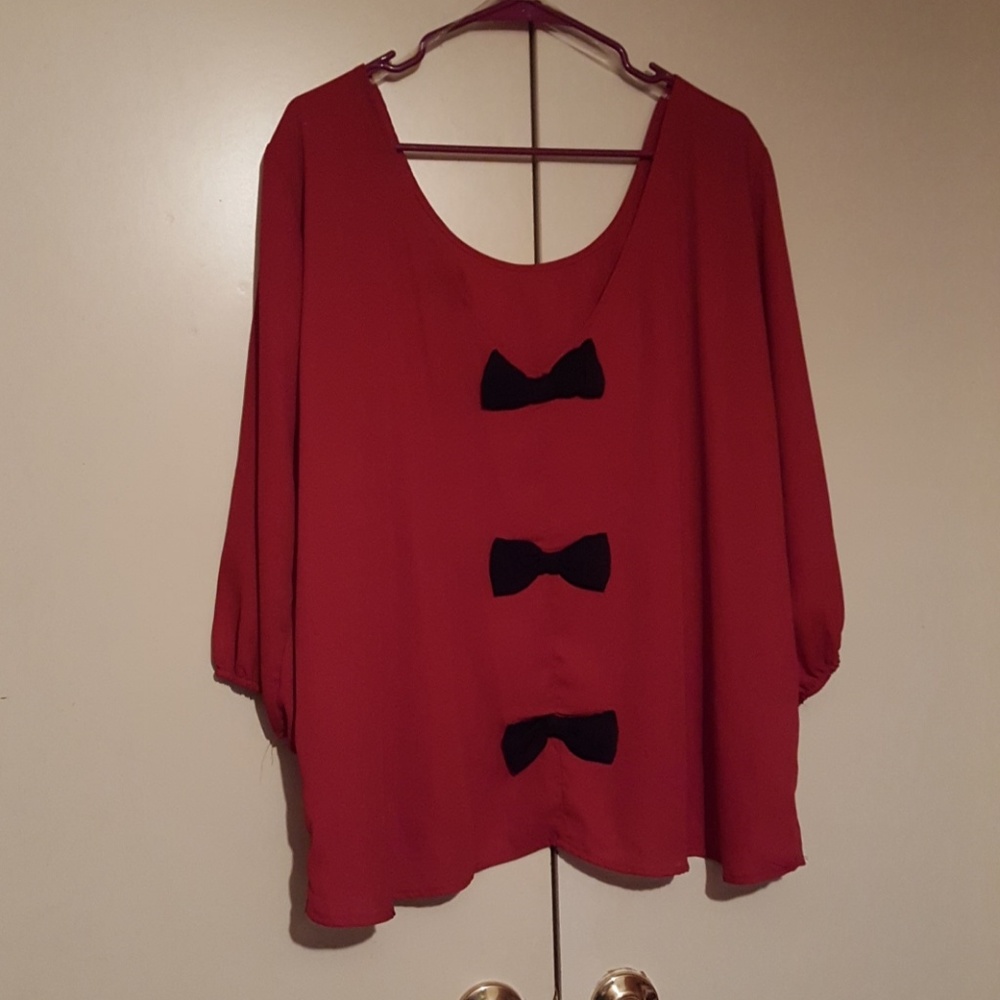 Gorgoues red top with black bows down back
